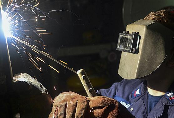 a welder welding metal